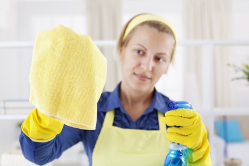 Cleaner treating hallway carpet in a local apartment building