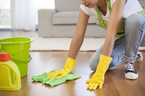 Local cleaning team handling builder residue after renovation work